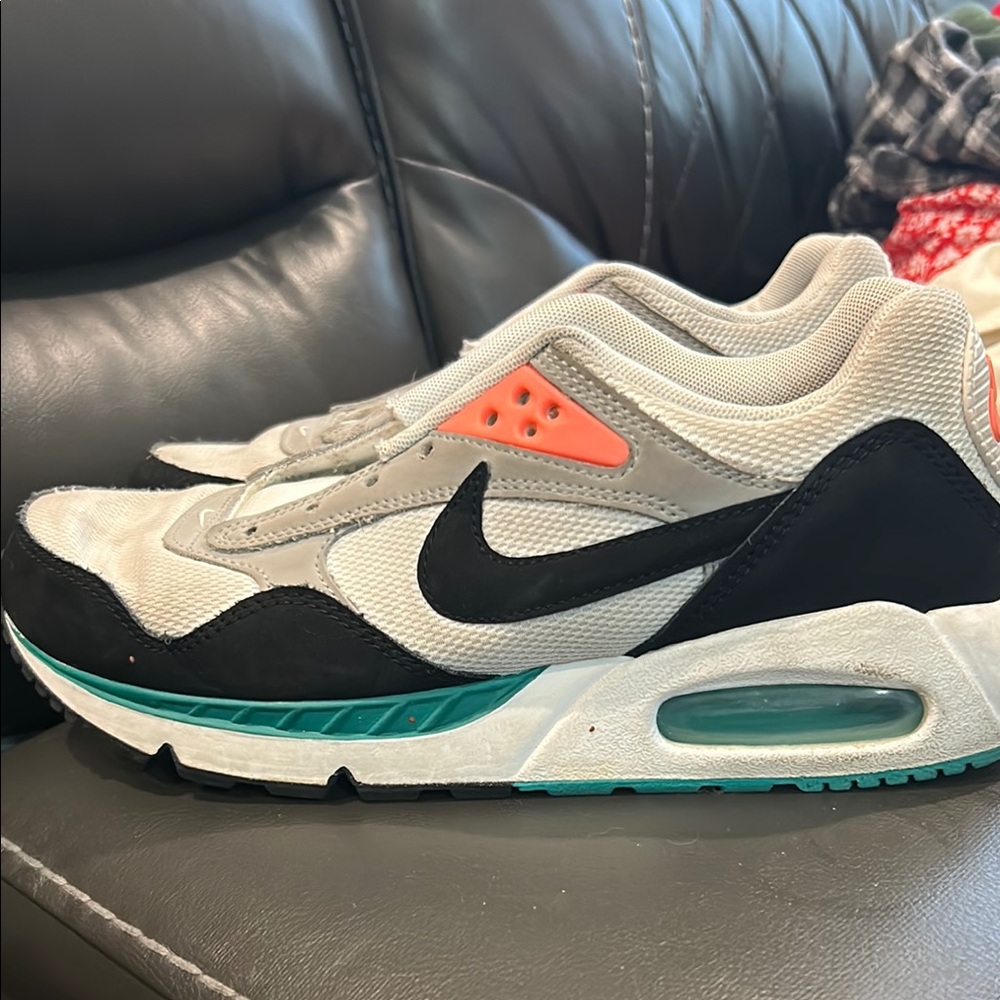 Nike Sneakers with Black, Gray, and Orange Highlights